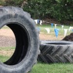 Seventh grade earth science class helps incorporate salvaged tires into the elementary playground
