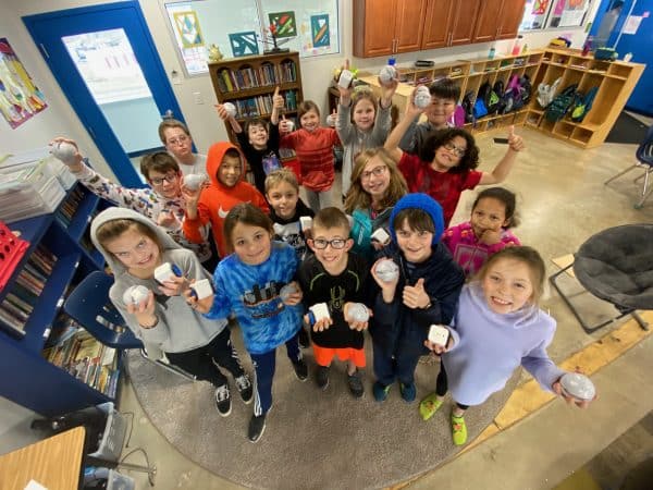 Photo by Bethany Gibbs of her fourth grade classroom as they first unpacked their Sphero Bolts, winter 2020