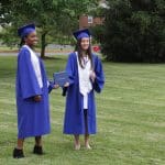 Commencement 2020. Virtue Adawe and Isabella Madrid