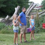 Tyler Kauffman with Sienna and Delaney check on progress on the fort.