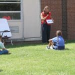Rebecca Yutzy teaches a 7th grade Spanish class outside.