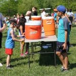 Eighth grade helps with games at elementary field day