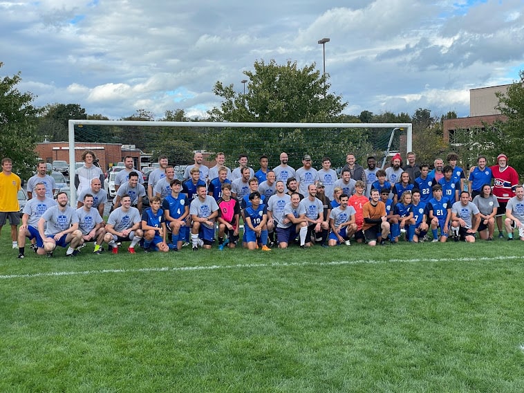 Alumni players and EMS boys varsity team after the homecoming match up on Oct. 16, 2021