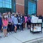 Eighth grade delivers snacks and gifts to health care workers 2021