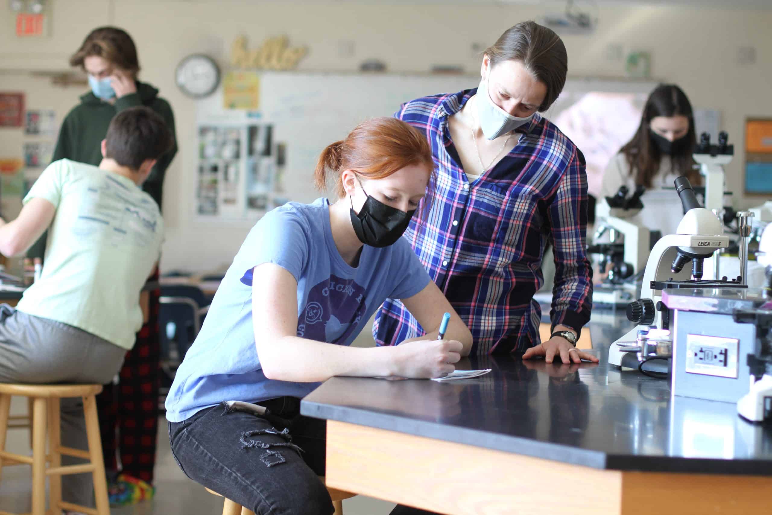 Claire Parsley '22 and Sarah Mitch, review Claire's project in zoology class. 