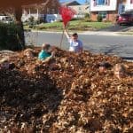 6th graders raked leaves around the school and in the neighborhood