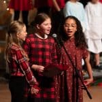 EMES Christmas program with students singing together