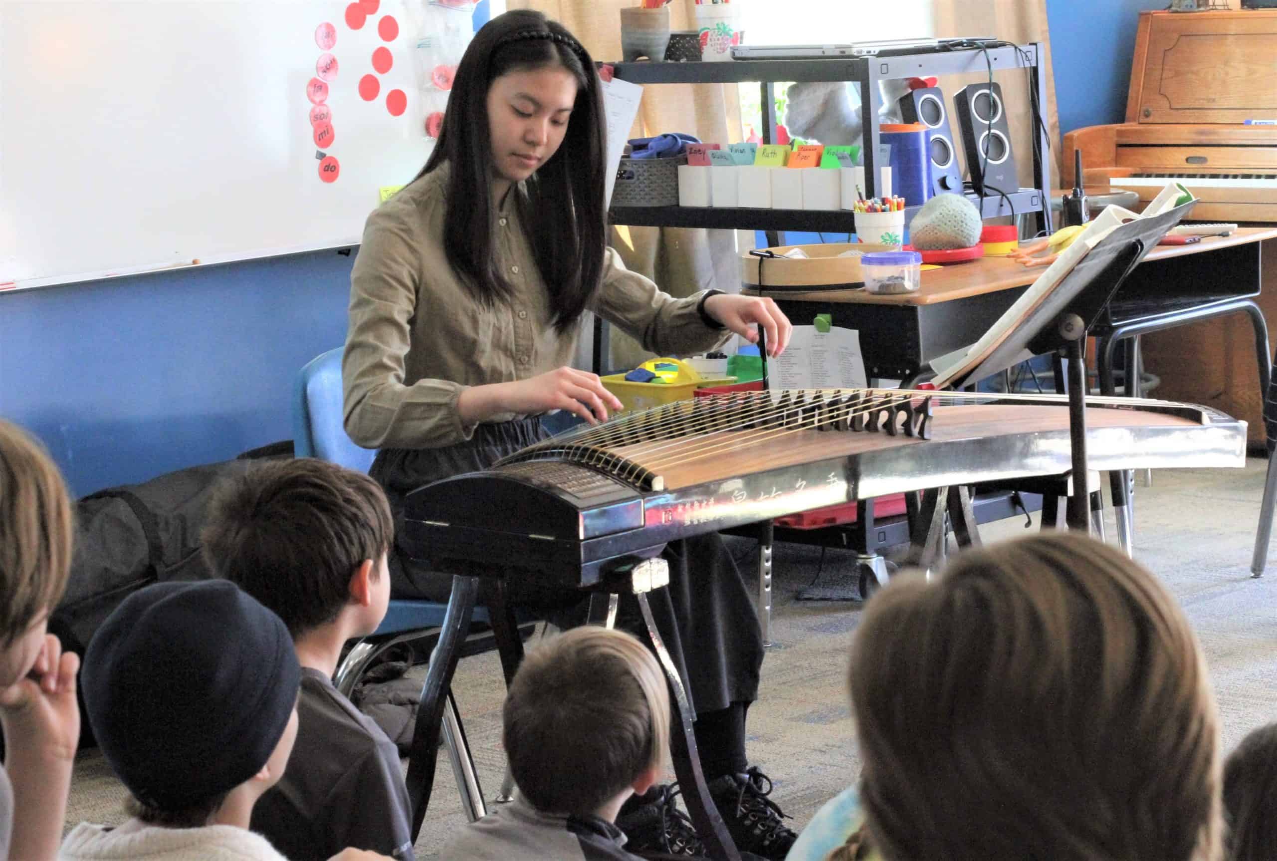 Guzheng demonstration in elementary music class