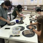 Students create raku ceramic tile quilt squares