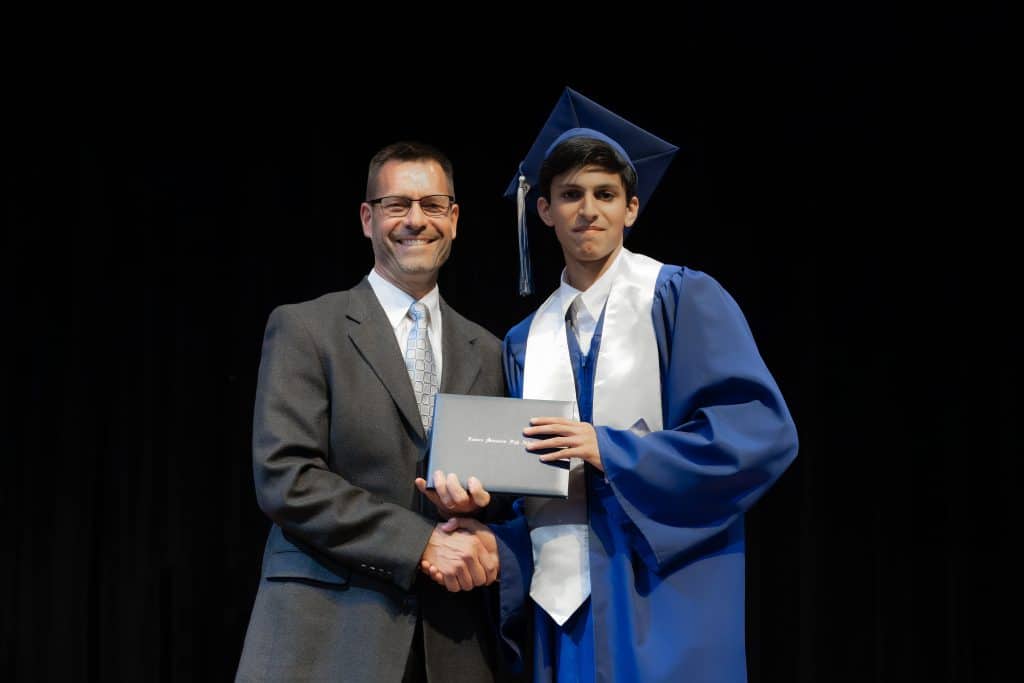 Dr. Paul Leaman with graduate, 2023