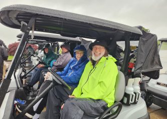 Supporters showed up in the rain for a golf tournamnet to raise funds for financial aid, athletics, and alumni connections.